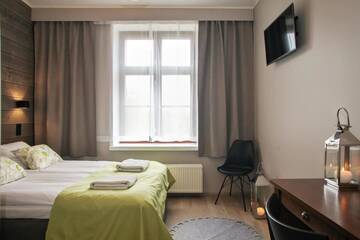 Фото номера Стандартный трехместный номер Отель Hotel Metsähirvas г. Муурола 2